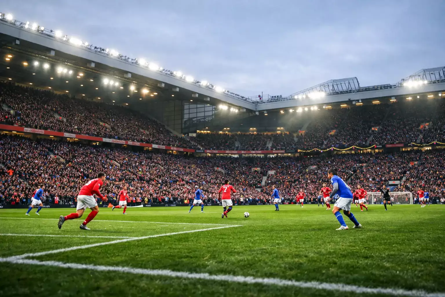 Packed football stadium on Boxing Day with festive supporters wearing scarves and winter clothing